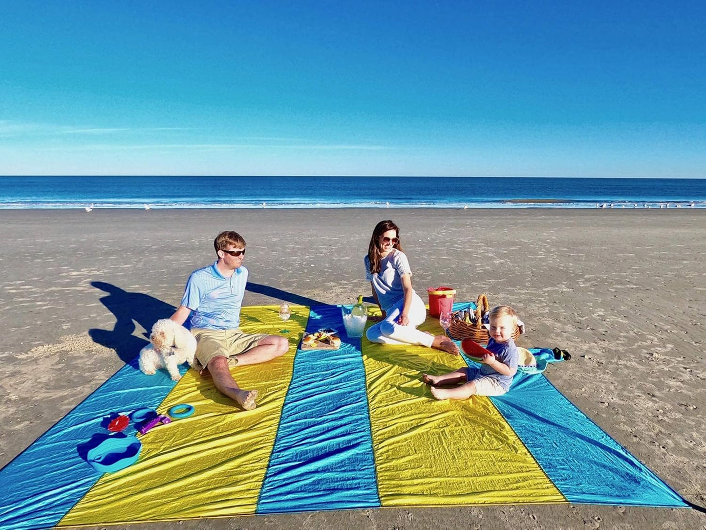 Premium XXL Beach Blanket Sandproof Water Resistant Quick Dry Mat 10Ft by 9Ft for 1-8 Adults with 4 Metal Stakes, 4 Corner Pockets, Secure Clip and Strap, and Attached Bag