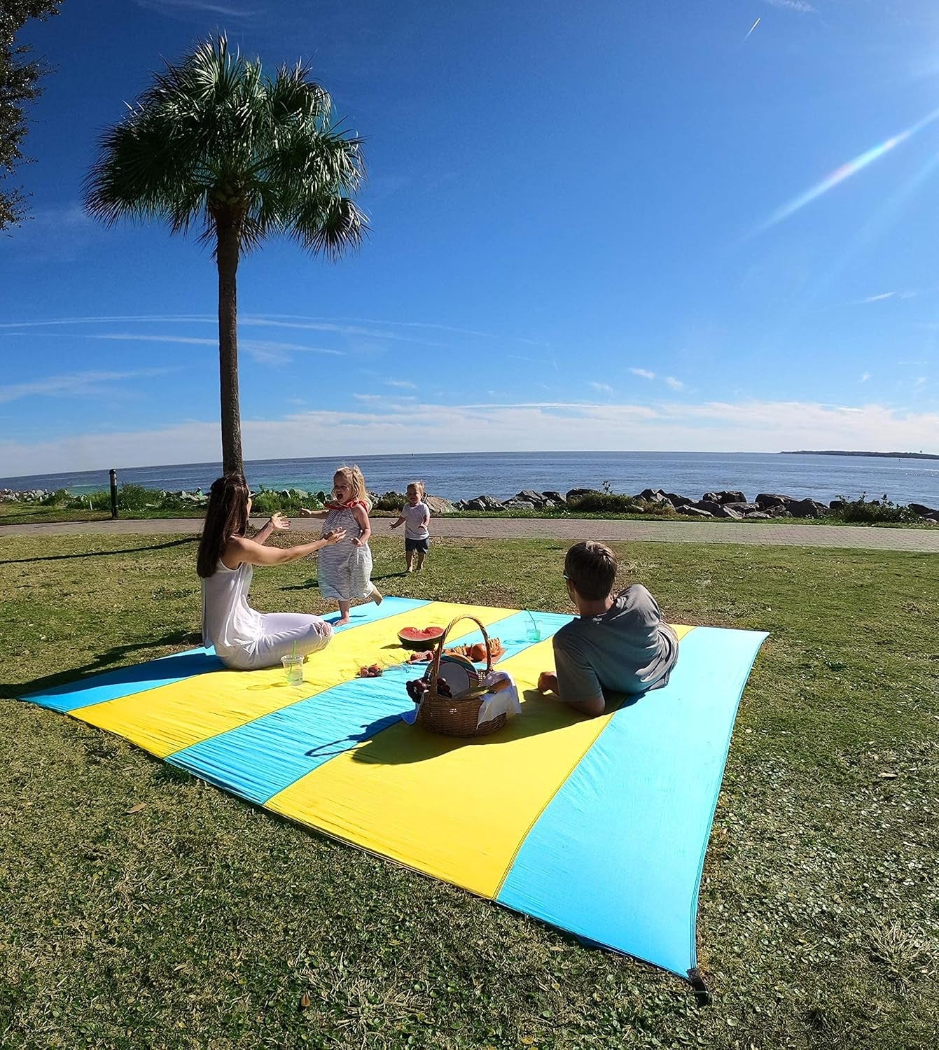 Premium XXL Beach Blanket Sandproof Water Resistant Quick Dry Mat 10Ft by 9Ft for 1-8 Adults with 4 Metal Stakes, 4 Corner Pockets, Secure Clip and Strap, and Attached Bag